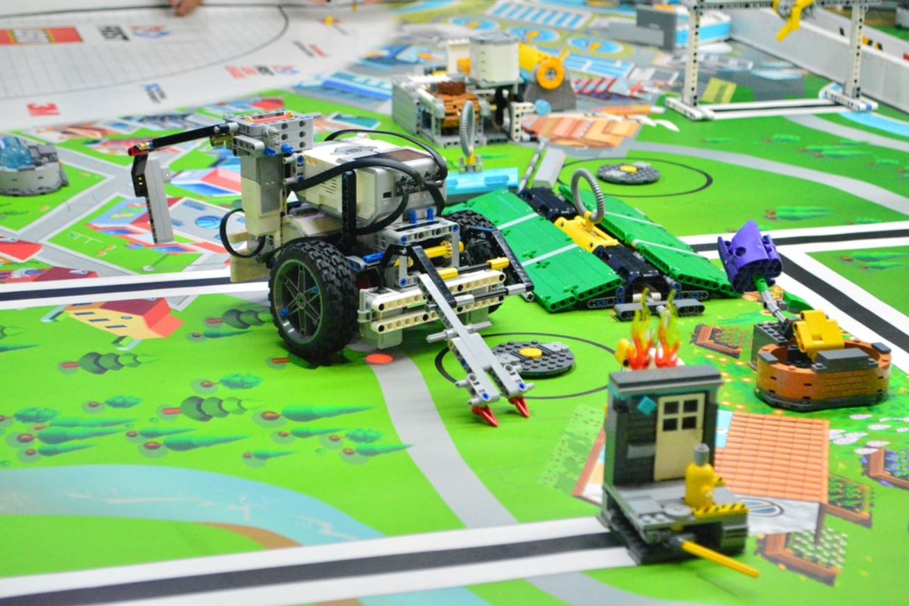 Robotic Structure On A Floor Mat Of A Illustrated Town